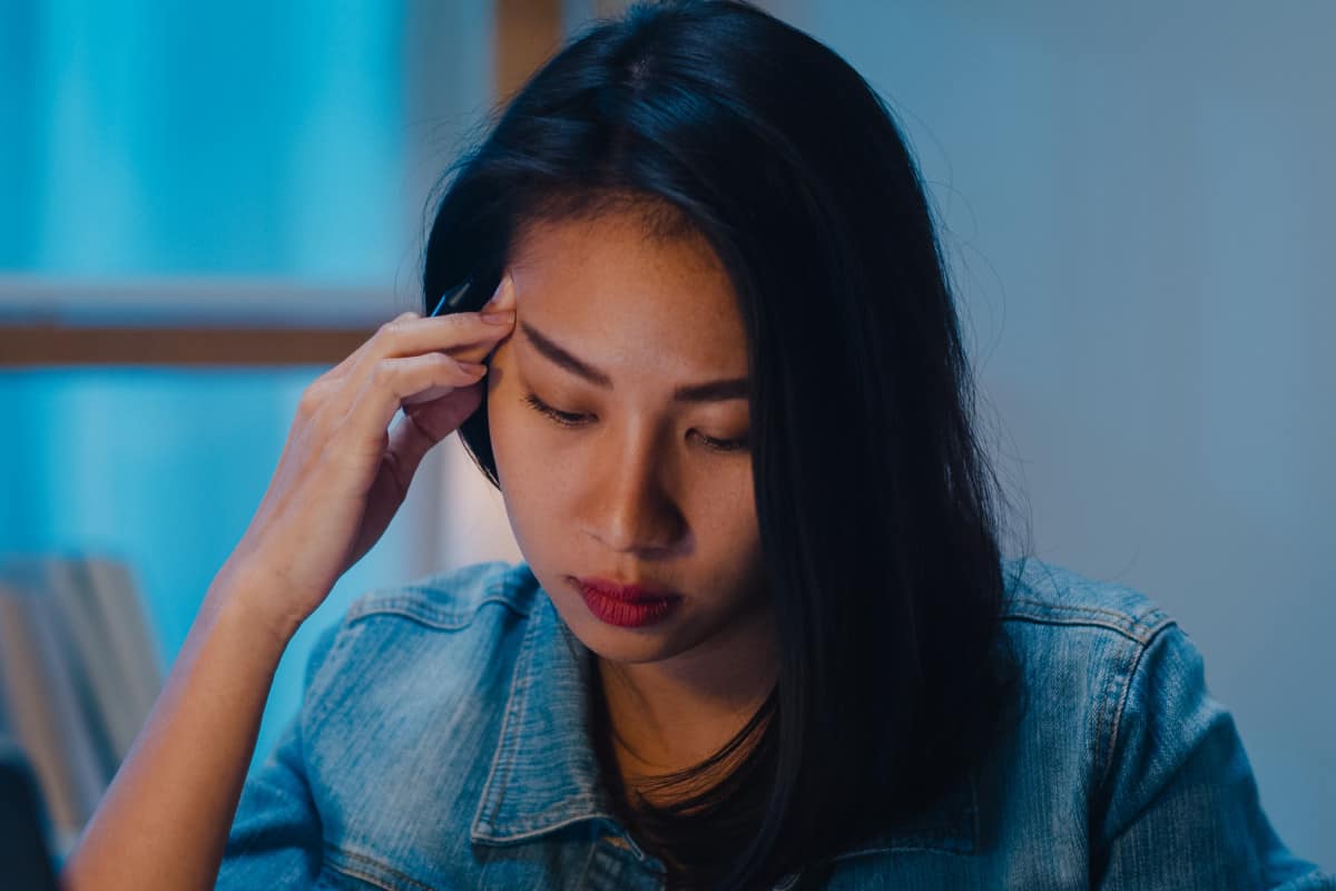 Stressed Out Businesswoman Working Late at Shift Job