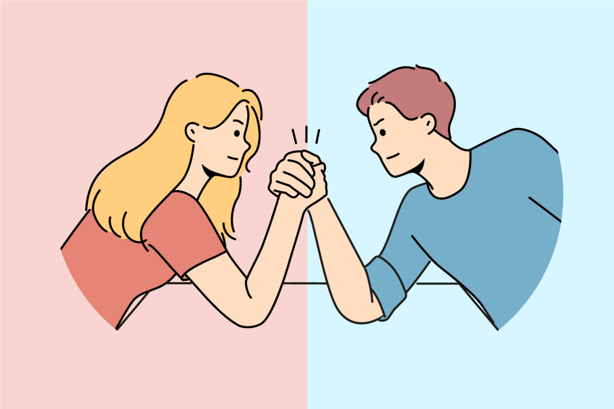 Man and woman arm wrestling